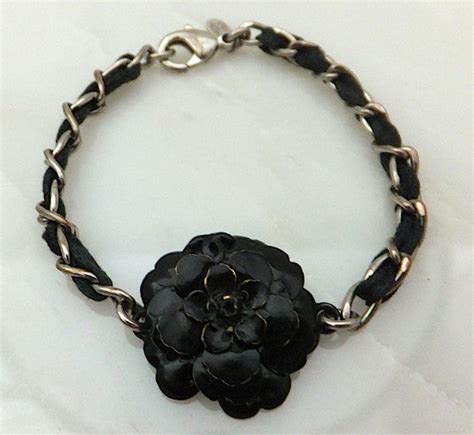 chanel black flower bracelet|chanel camelia necklace.